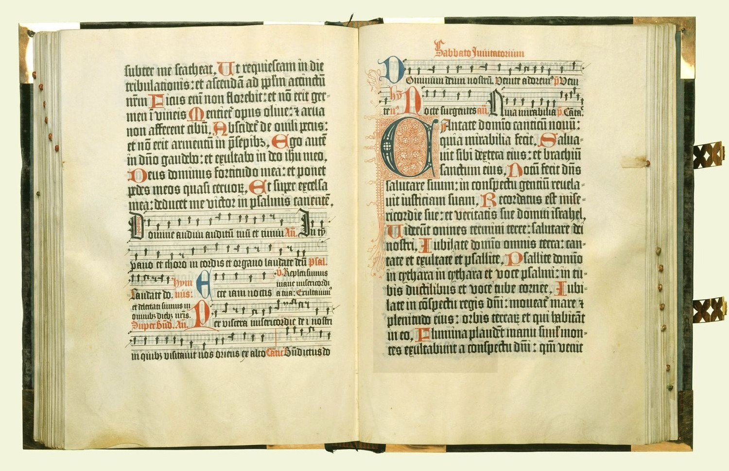 Two pages of the 1457 Mainz Psalter show large decorated red-and-blue initials among lines of black text.