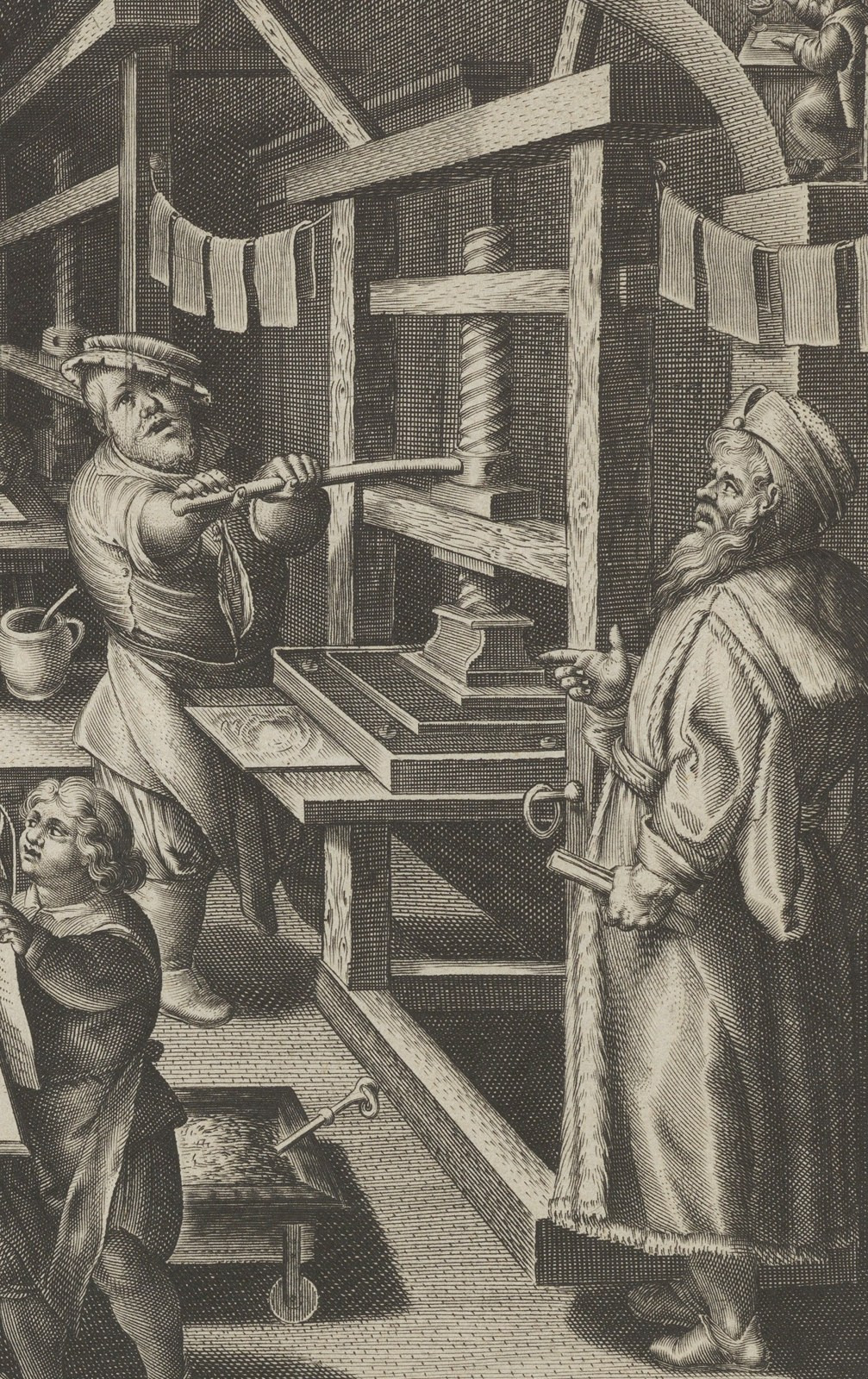 In a cropped engraving, one worker pulls the press bar while another stands beside the extended press bed; sheets hang above.